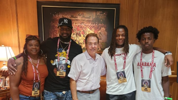 Myles Johnson with Nick Saban